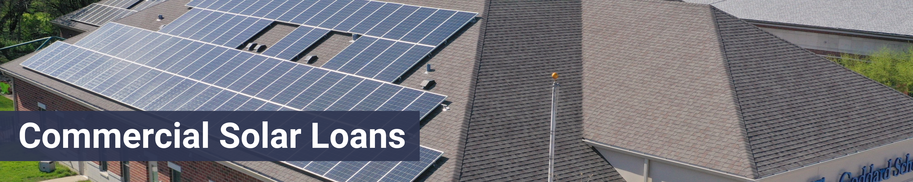Solar panels on commercial building roof top header image